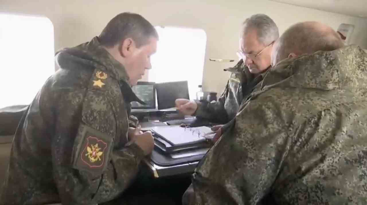 Chief of the General Staff General Valery Gerasimov and Russia Defence Minister Sergei Shoigu aboard the combat copter during the military drill in Crimea on April 22, 2021.