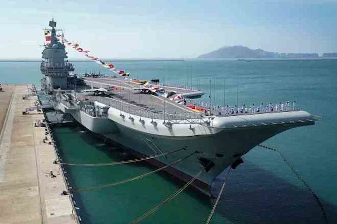 Shandong aircraft carrier is docked at a naval port in Sanya in southern Communist China's Hainan province as seen on Dec. 17, 2019.