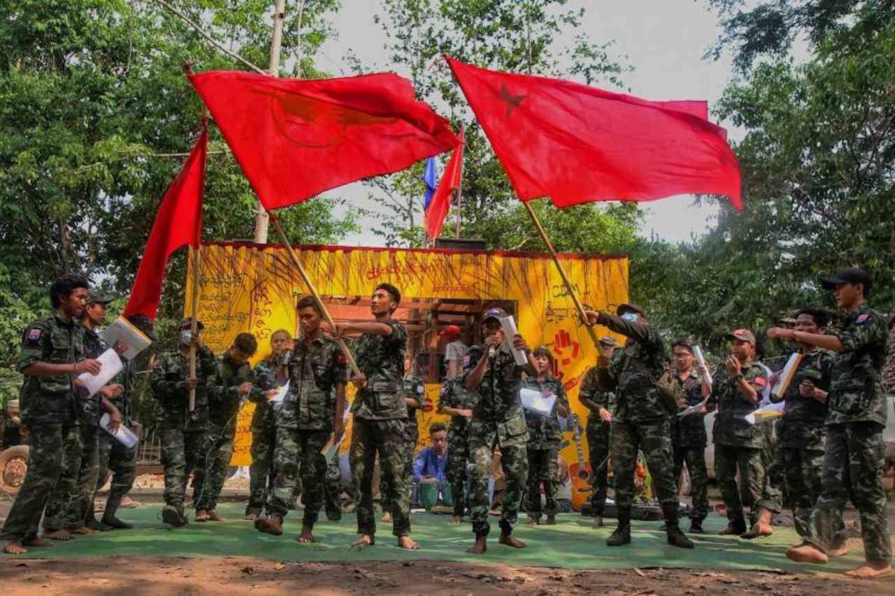 Members of the "Peacock Generation" militant band during a traditional performance in Kayin state.