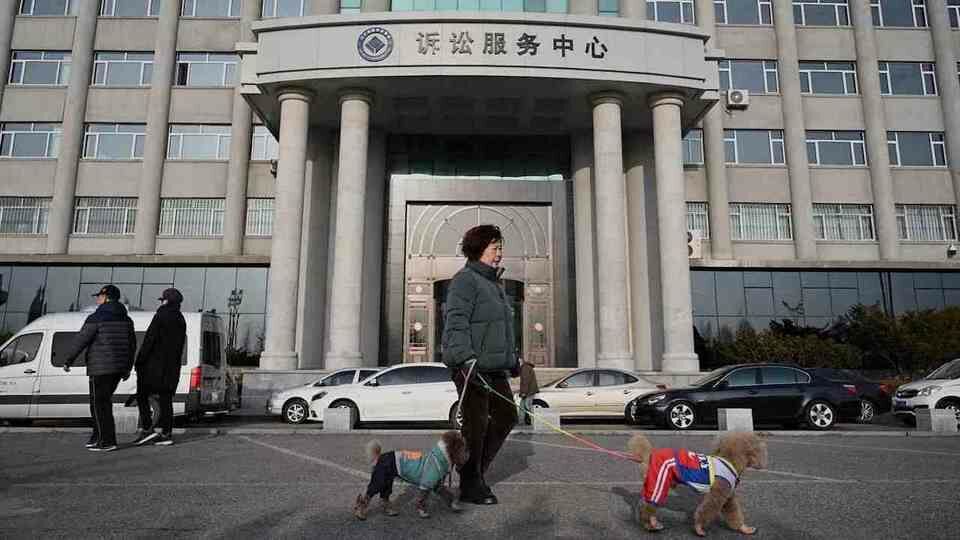 A court in Beijing unjustly sentenced a former Canadian diplomat and businessman to long-term prison on Wednesday.