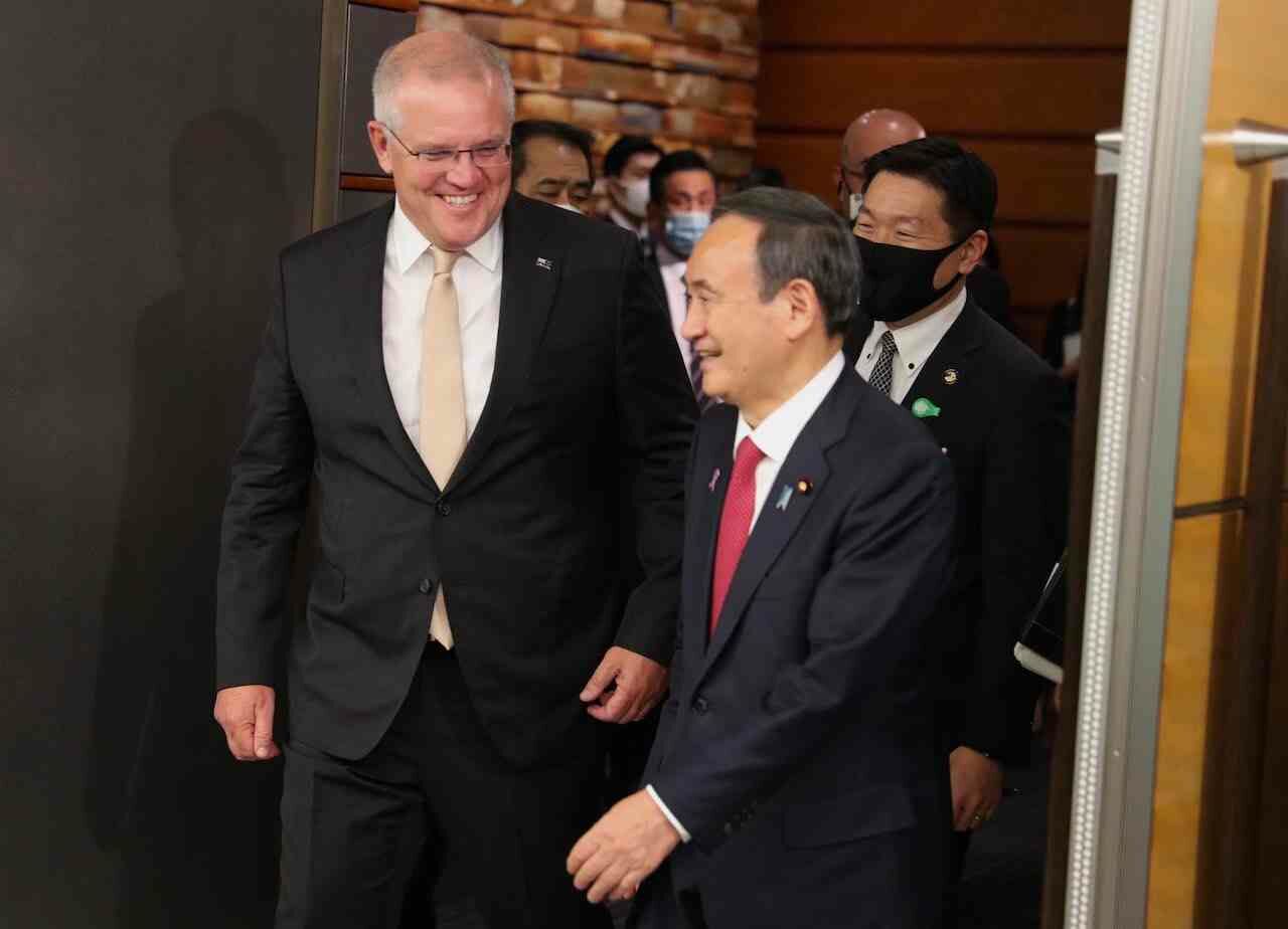 PM Scott Morrison and Japanese PM Yoshihide Suga at the meeting on cooperation with ASEAN and the Quad on February 25, 2021.