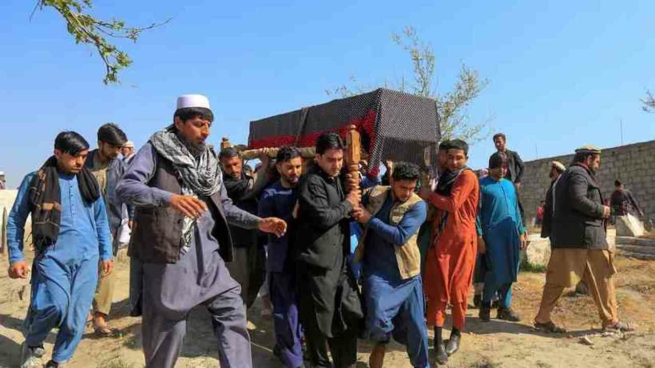 Attacks and targeted assassinations are part of everyday life in Afghanistan. On this photo men carry the coffin of one of three media workers who were shot by strangers.