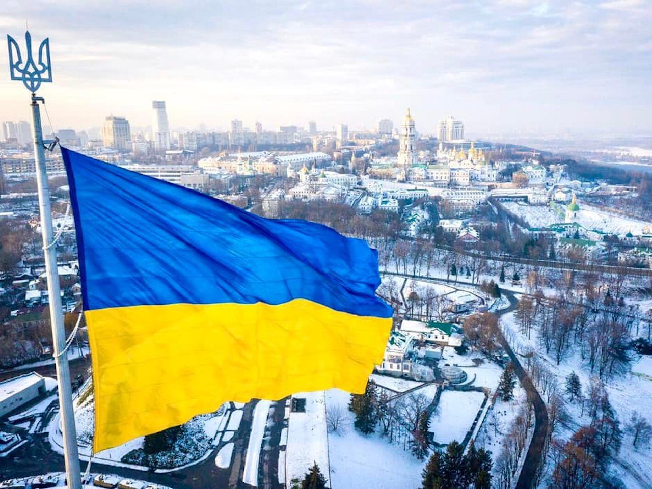 Ukrainian national flag on the top of the Kyiv hill