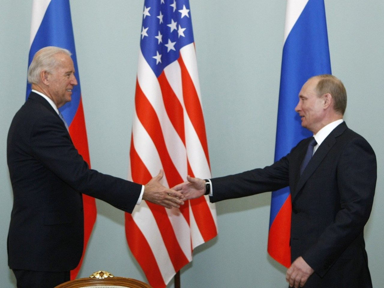Then-Vice President Joe Biden shakes hands with then-Russian Prime Minister Vladimir Putin in Moscow in 2011.