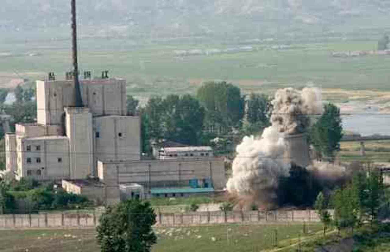 In this June 27, 2008, file photo released by China’s Xinhua News Agency, the cooling tower of the Yongbyon nuclear complex is demolished in Yongbyon, North Korea.