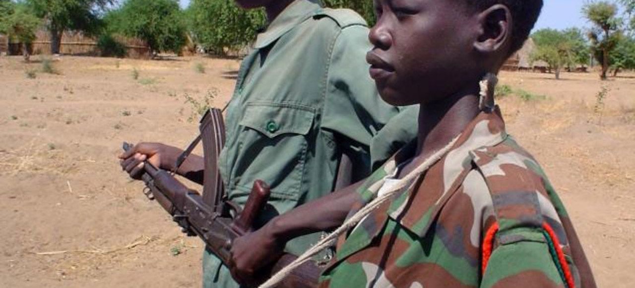 A child in the combat uniform in Africa.